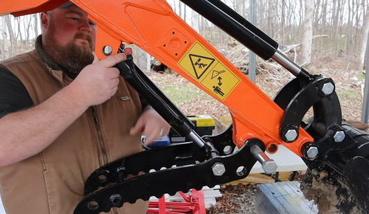 How to install a hydraulic thumb on an excavator