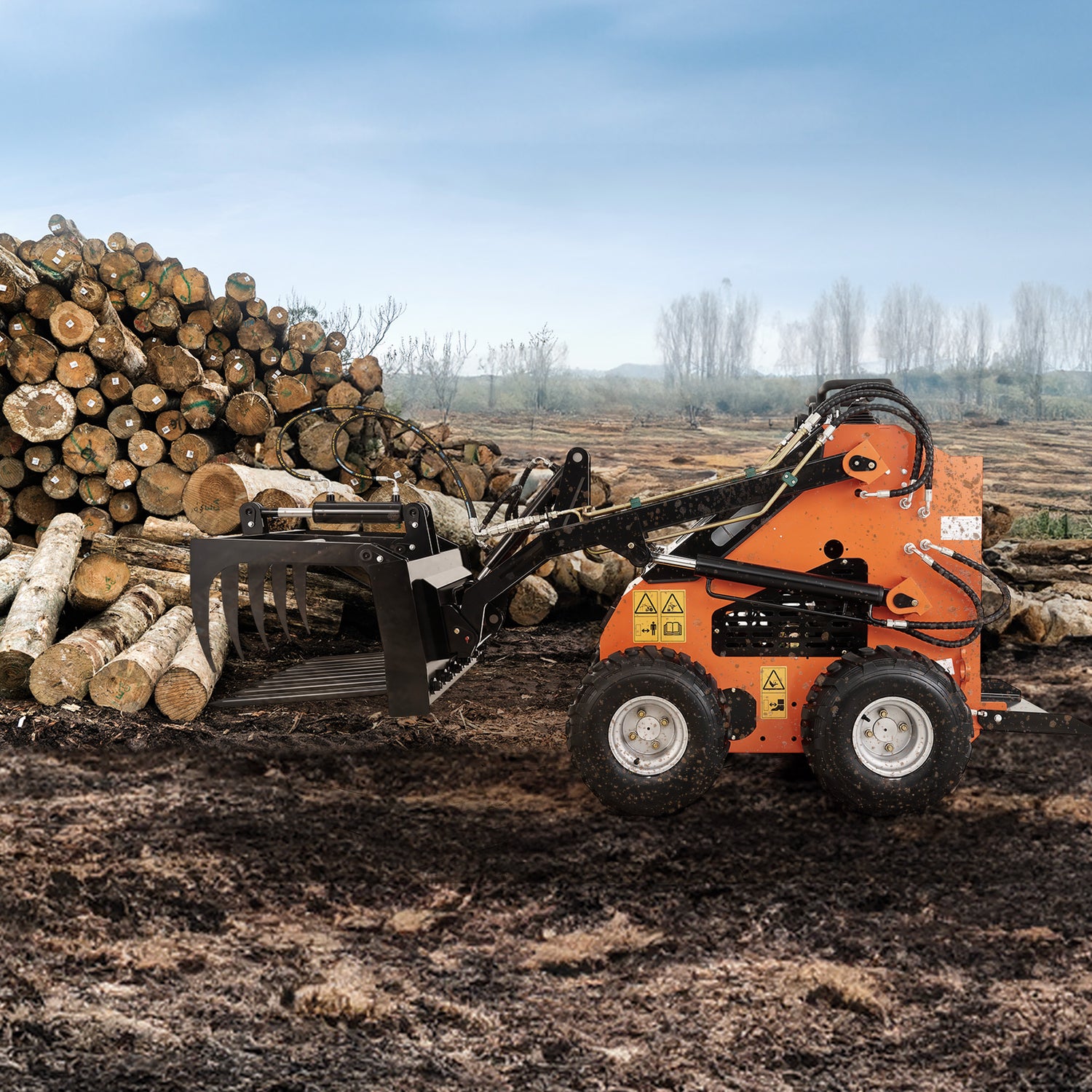 hydraulic grab fork attachment for a skid steer